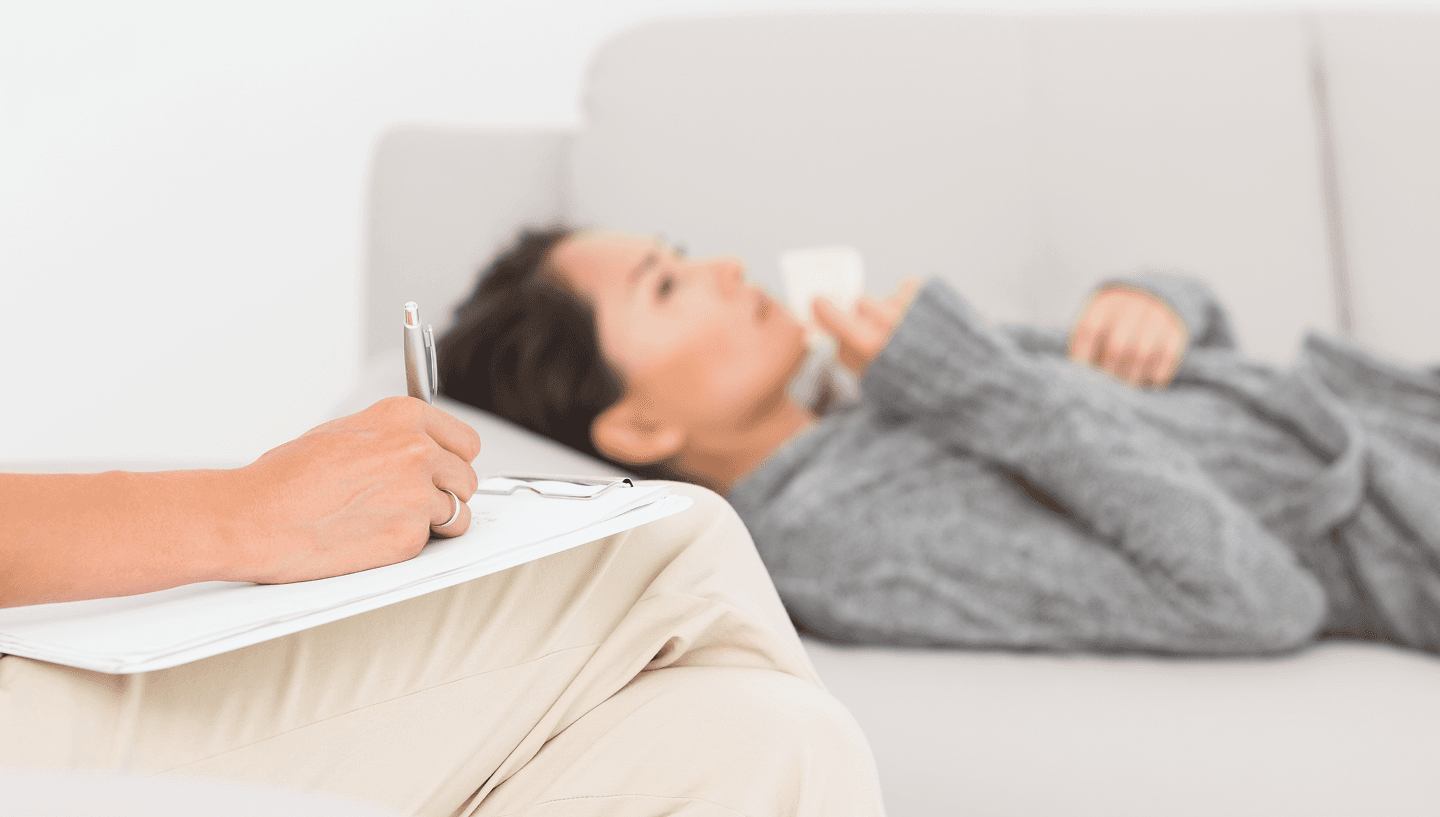 Dominique with certificates and artwork